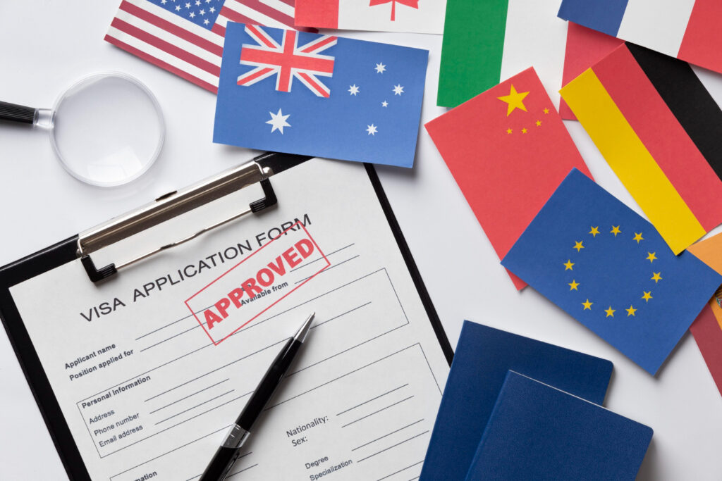 Approved visa application form with flags of various countries, including Australia. Preparing for the Australian Citizenship Test?